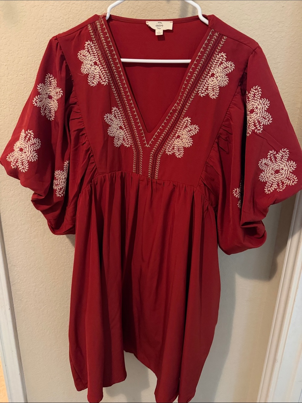 Entro  not quite red/ dark orange. Dress with White Embroidery